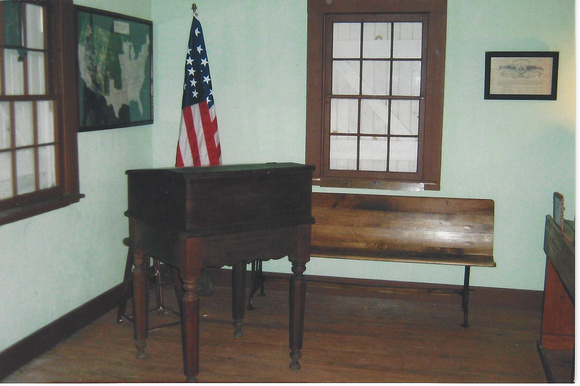 Photo_CKSH_interior teacher's desk, bench, flag, map
